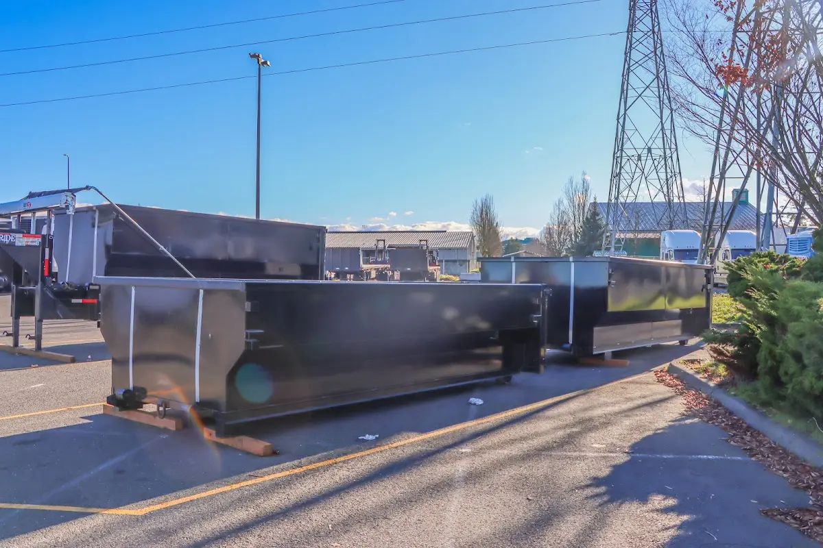 Roll-off dumpster ready for waste disposal at job site for Construction Dumpster Rental in Anderson